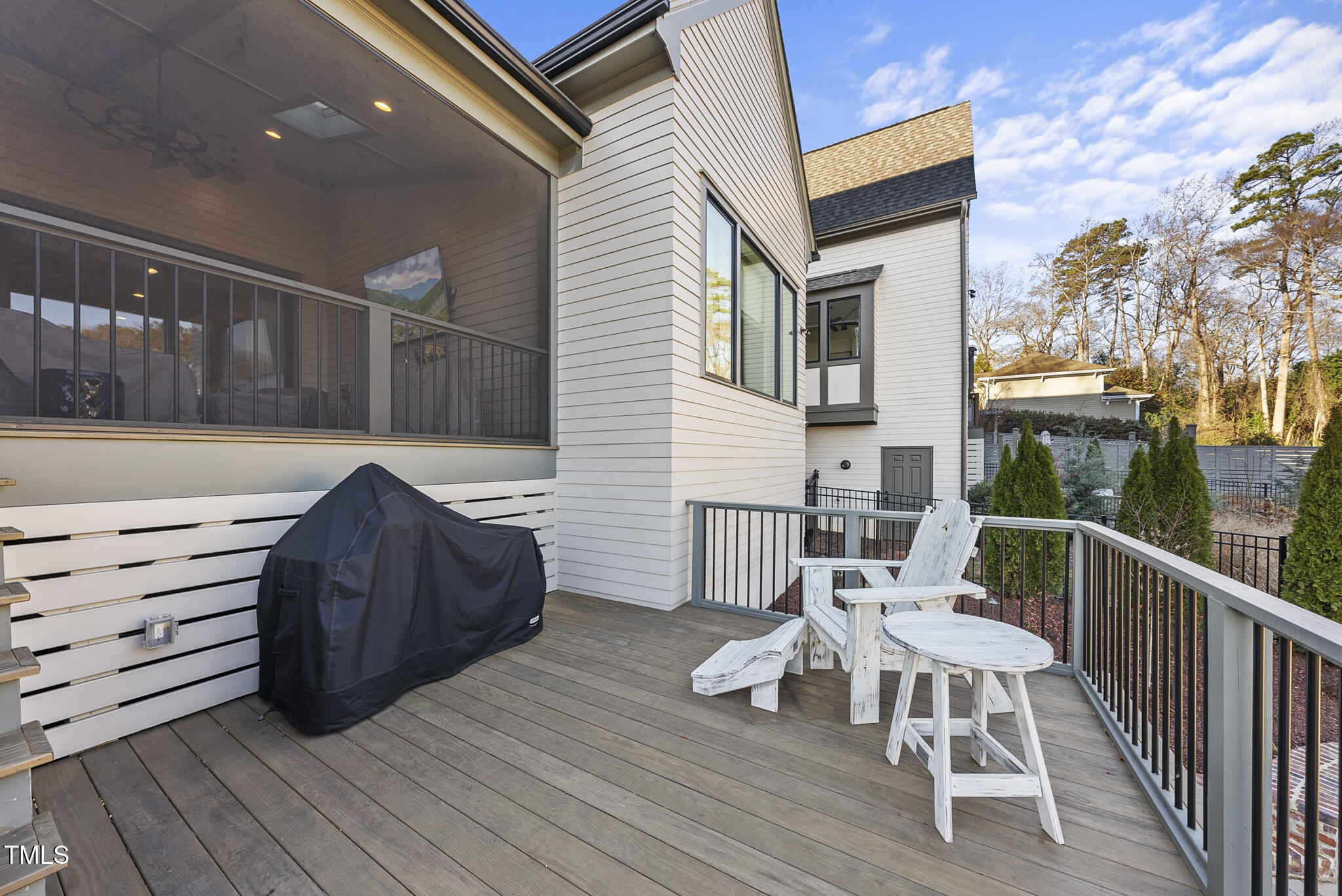 3018 Farrior Road Raleigh, NC 27607 - Photo 44 of 59 a view of a chair and tables in the balcony