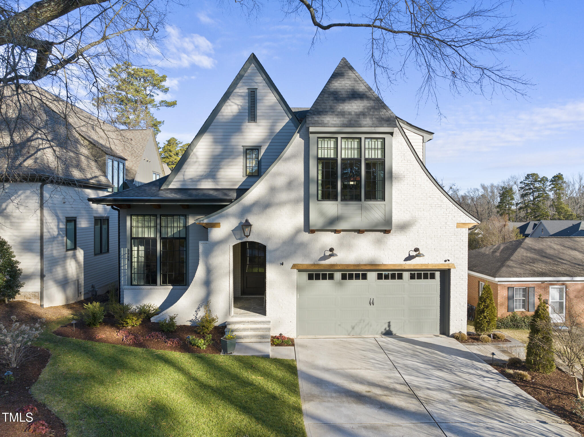 3018 Farrior Road Raleigh, NC 27607 - Photo 50 of 59 a front view of a house with a yard