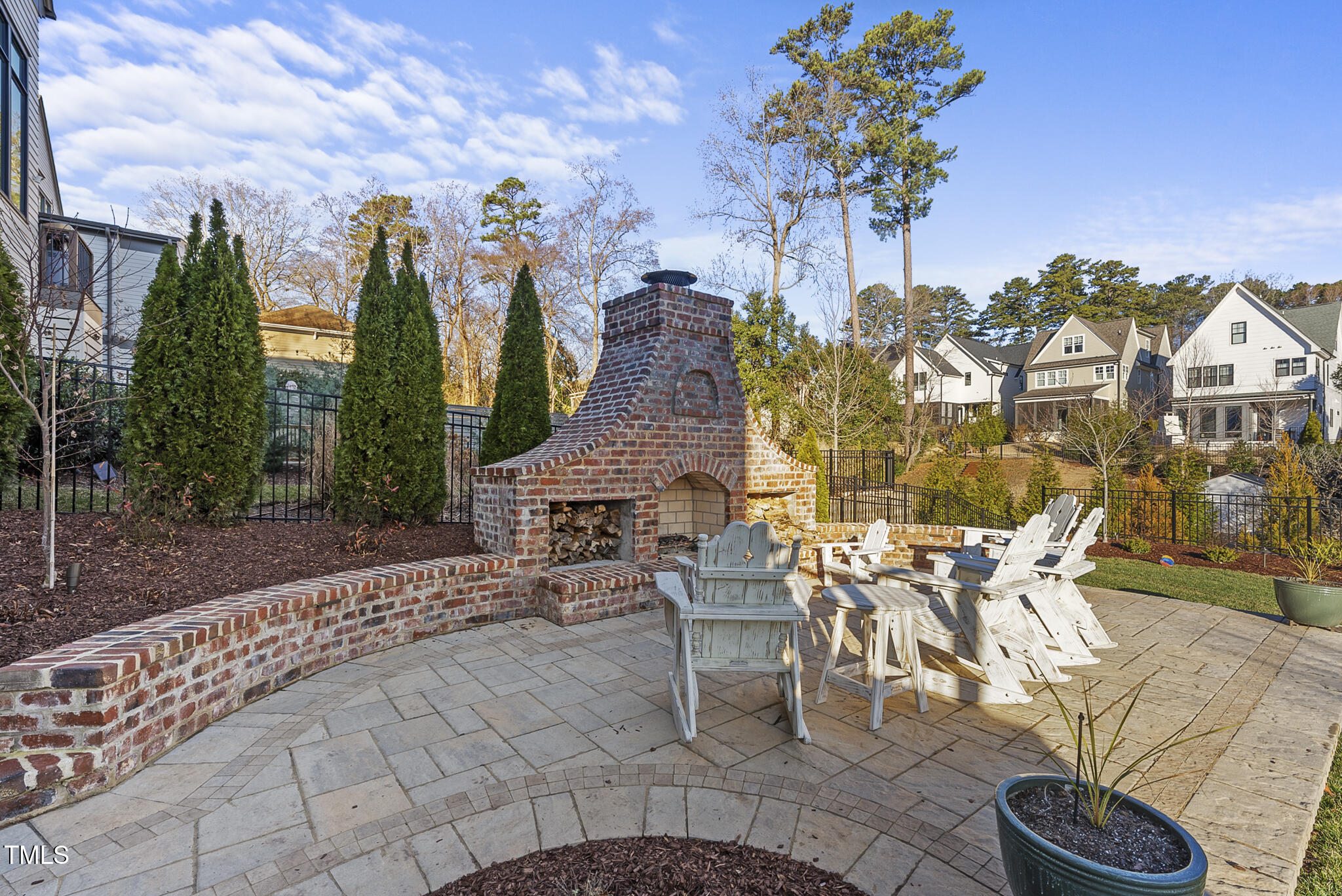 3018 Farrior Road Raleigh, NC 27607 - Photo 10 of 59 a view of a patio with table and chairs and potted plants