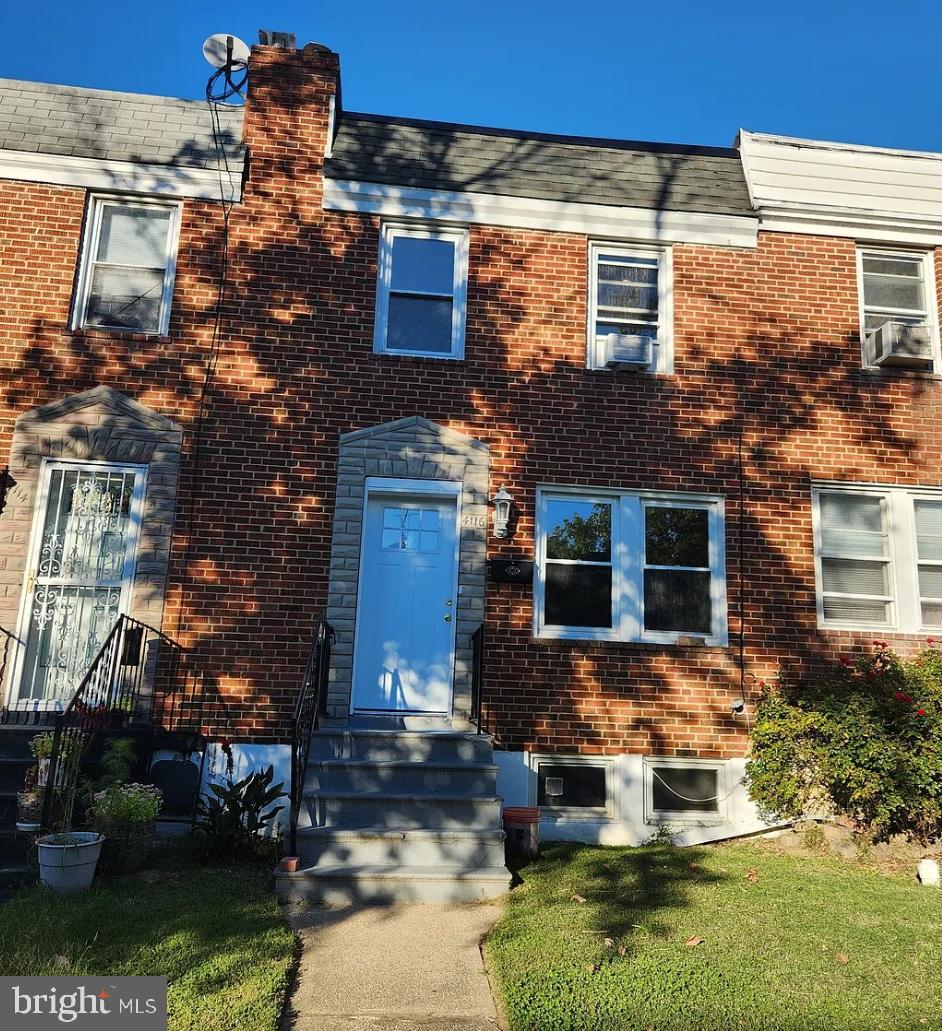 4116 Raymonn Avenue Baltimore, MD 21213 - Photo 1 of 16 front view of a house with a yard