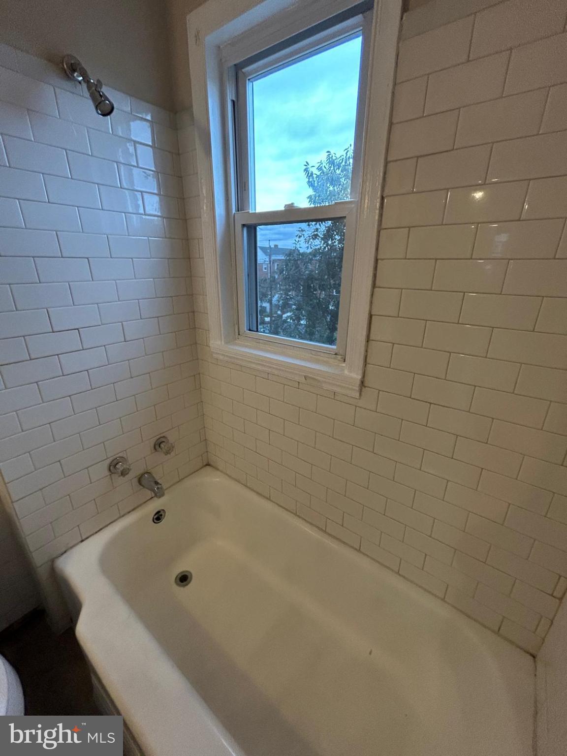 4116 Raymonn Avenue Baltimore, MD 21213 - Photo 11 of 16 a bathroom with a bathtub and a shower