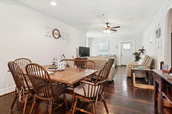 a view of a dining room with furniture