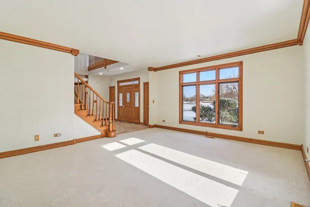 a view of an empty room and window