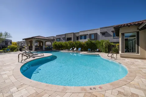 a room with gym equipment and a large window