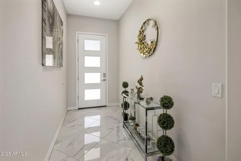 a view of an entryway with sitting area