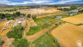 19 East Southfield Road Spanish Fork, UT 84660 - Photo 51 of 74 View of property location featuring a mountainous background and rural landscape
