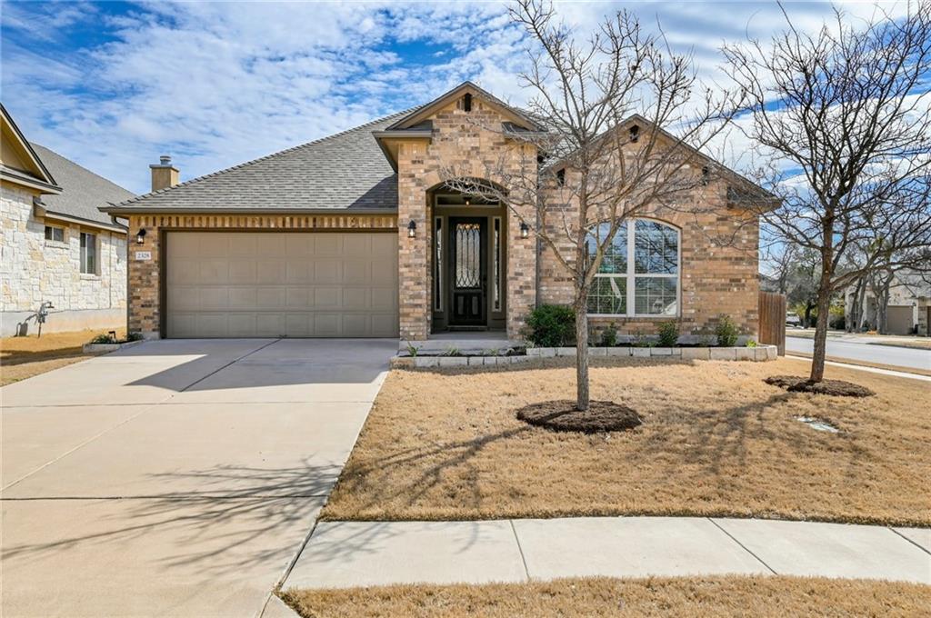 a front view of a house with street