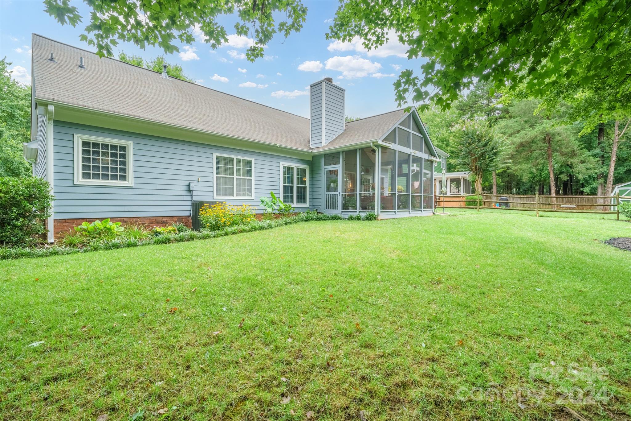 7401 Reedy Creek Road Charlotte, NC 28215 - Photo 22 of 25 a front view of house with yard and green space