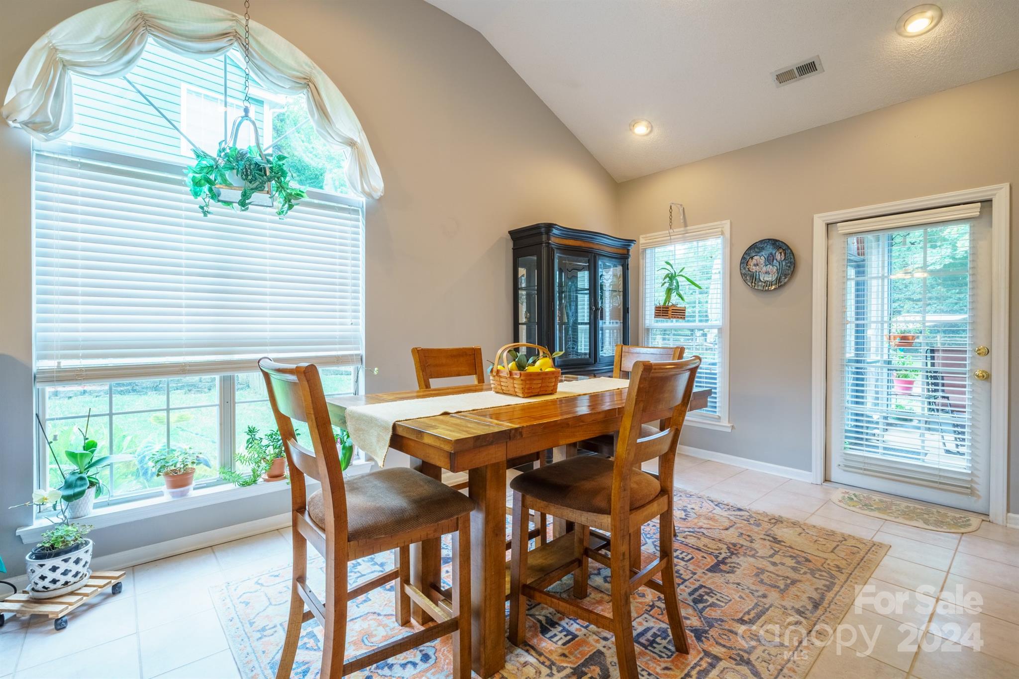 7401 Reedy Creek Road Charlotte, NC 28215 - Photo 8 of 25 a view of a dining room with furniture window and outside view