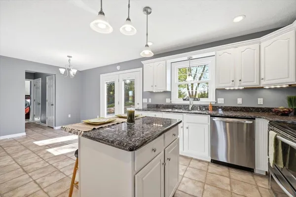 a view of front door with wooden floor
