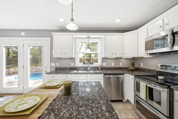 a bathroom with a shower and toilet