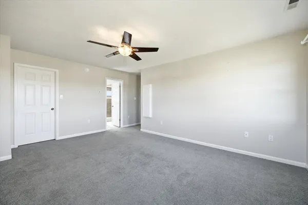 a living room with furniture kitchen and a kitchen island