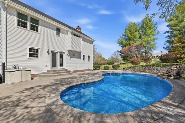 a view of an empty room and fire place