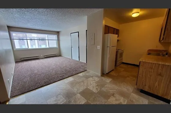 a view of hallway with windows