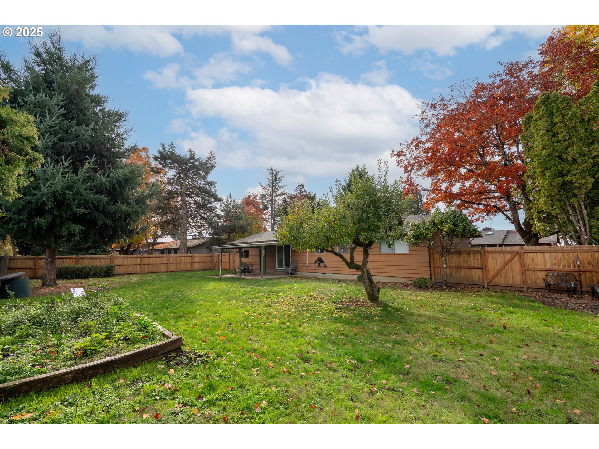 3472 Hoodview Drive Hubbard, OR 97032 - Photo 19 of 23 a garden with trees in the background