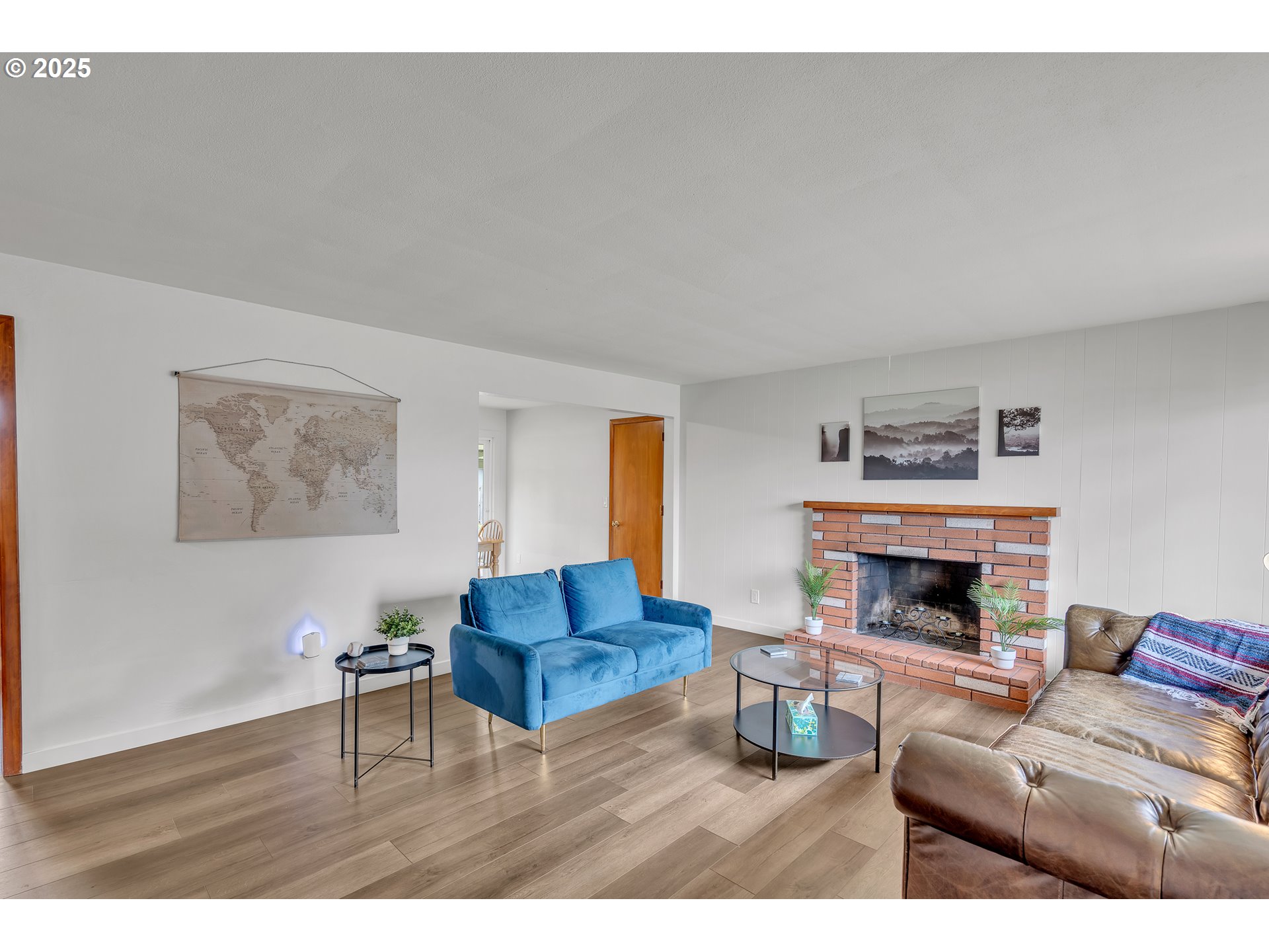 3472 Hoodview Drive Hubbard, OR 97032 - Photo 4 of 23 a living room with furniture and a fireplace