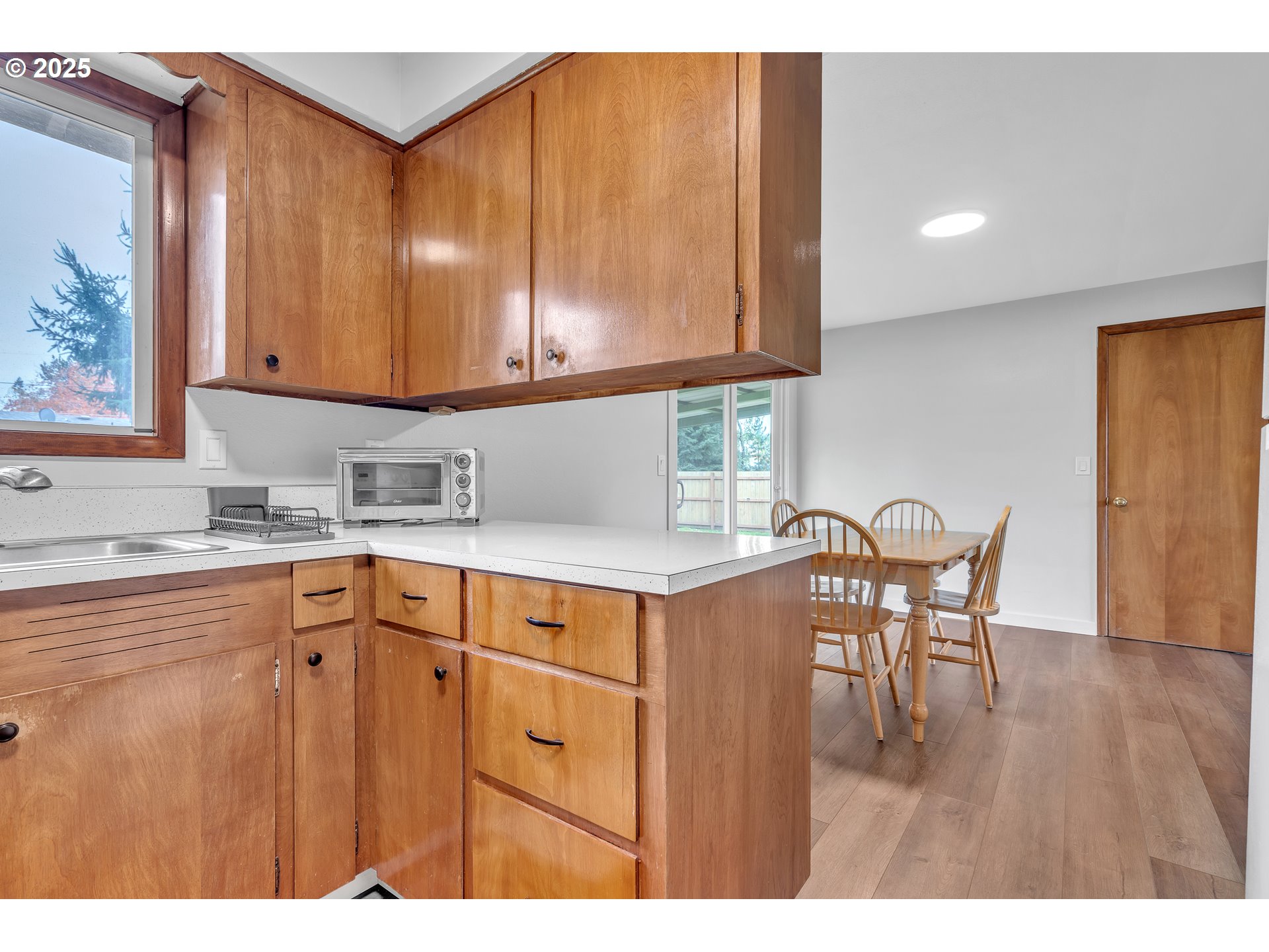 3472 Hoodview Drive Hubbard, OR 97032 - Photo 9 of 23 a kitchen with stainless steel appliances granite countertop a sink and cabinets