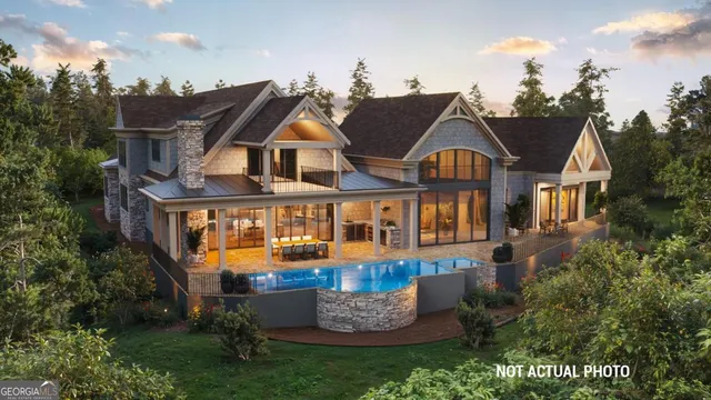 a front view of a house with a garden and plants