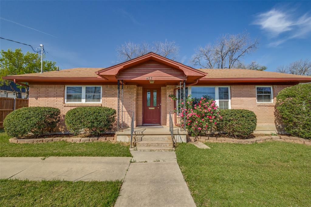 433 Fulton Street Denton, TX 76201 - Photo 1 of 25 a front view of a house with a garden and plants