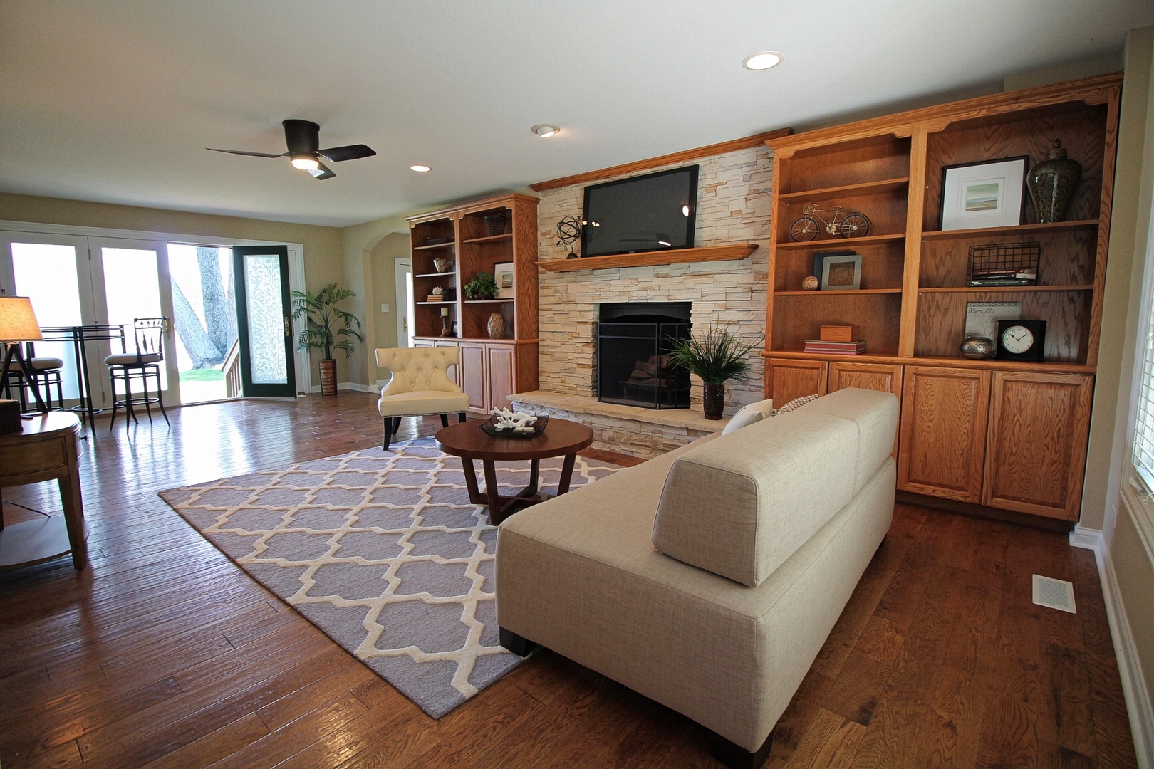4444 Riverside Drive Crystal Lake, IL 60014 - Photo 11 of 30 a living room with furniture and a fireplace
