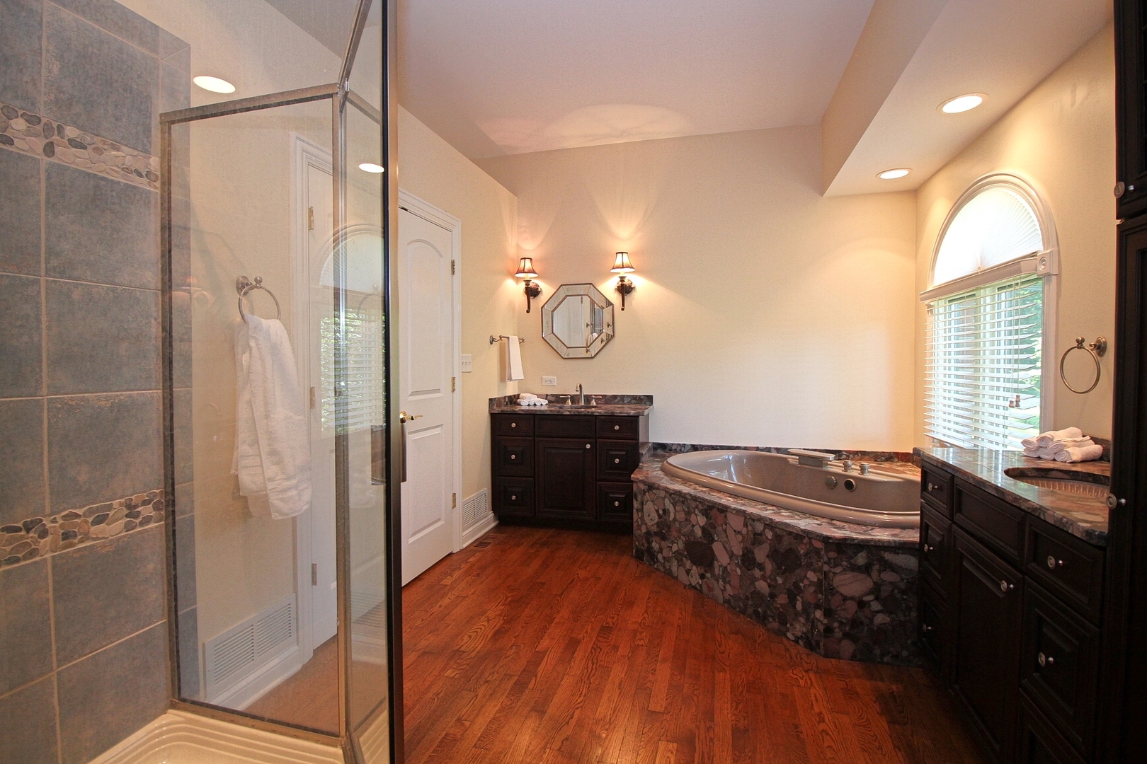 4444 Riverside Drive Crystal Lake, IL 60014 - Photo 15 of 30 a bathroom with a sink a vanity and a mirror