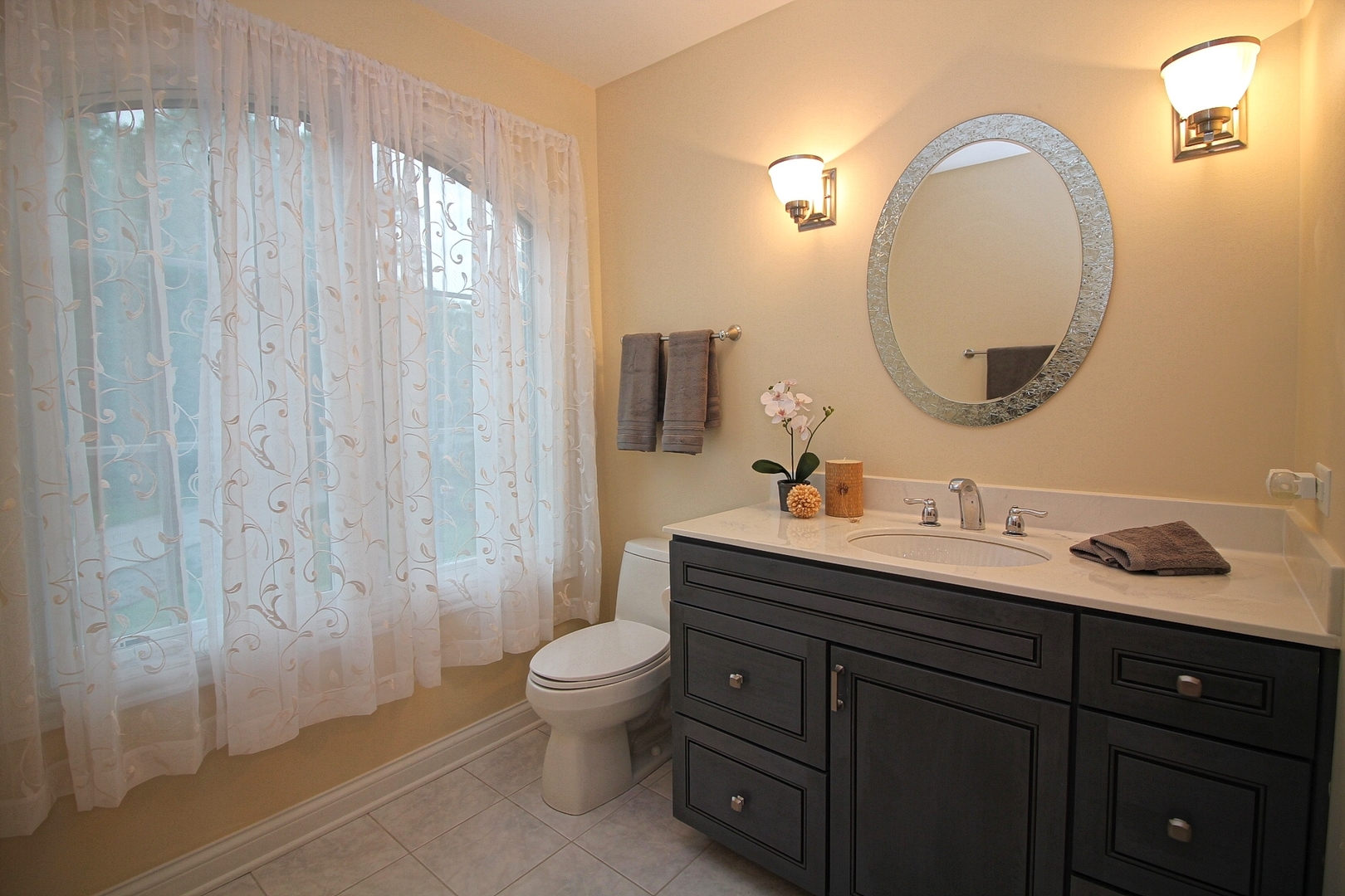 4444 Riverside Drive Crystal Lake, IL 60014 - Photo 19 of 30 a bathroom with a toilet a sink a mirror and a shower