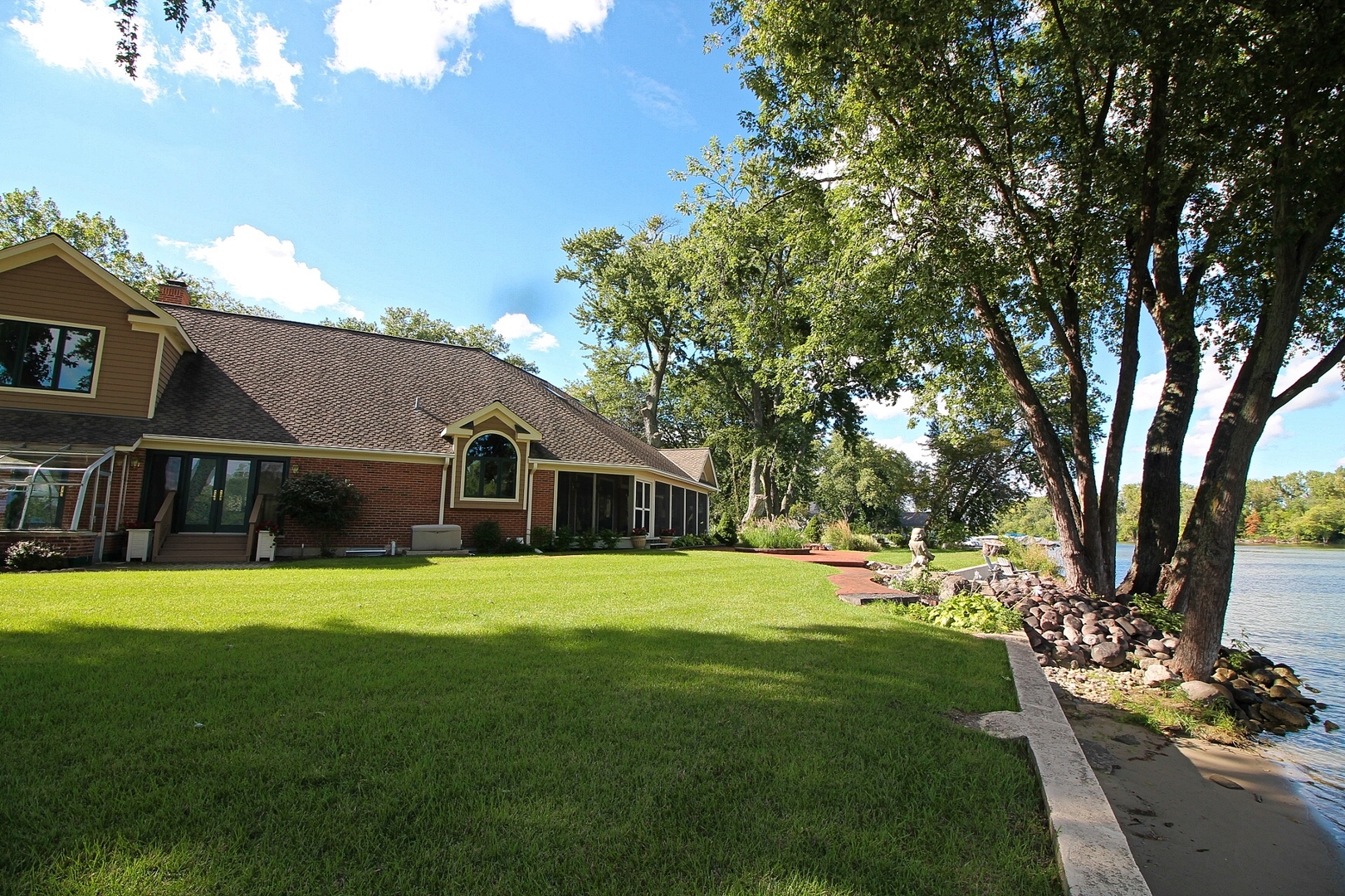4444 Riverside Drive Crystal Lake, IL 60014 - Photo 24 of 30 a front view of a house with a yard