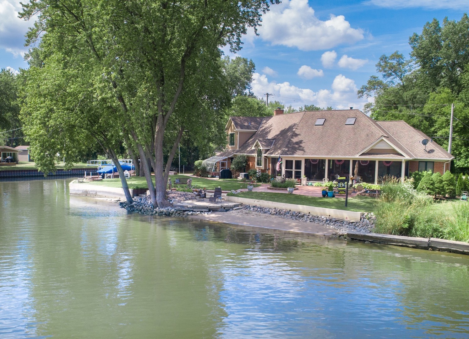 4444 Riverside Drive Crystal Lake, IL 60014 - Photo 27 of 30 a house with swimming pool in front of it