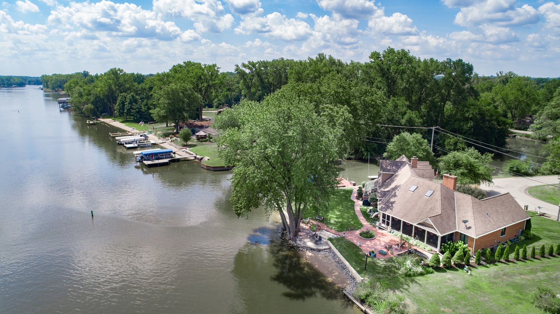4444 Riverside Drive Crystal Lake, IL 60014 - Photo 28 of 30 an aerial view of a house with garden space and lake view