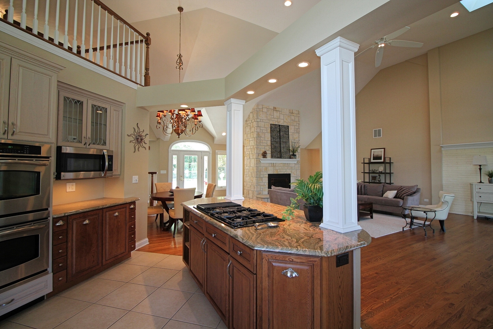 4444 Riverside Drive Crystal Lake, IL 60014 - Photo 8 of 30 a kitchen with stainless steel appliances granite countertop a stove a sink dishwasher and a refrigerator with wooden floor