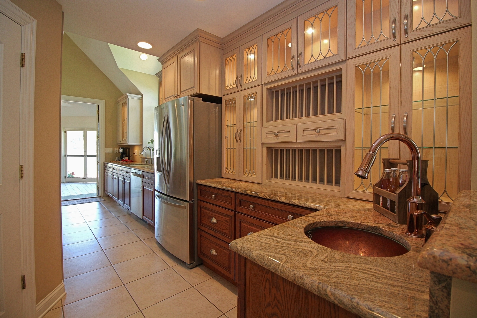 4444 Riverside Drive Crystal Lake, IL 60014 - Photo 9 of 30 a kitchen with a sink stove and cabinets