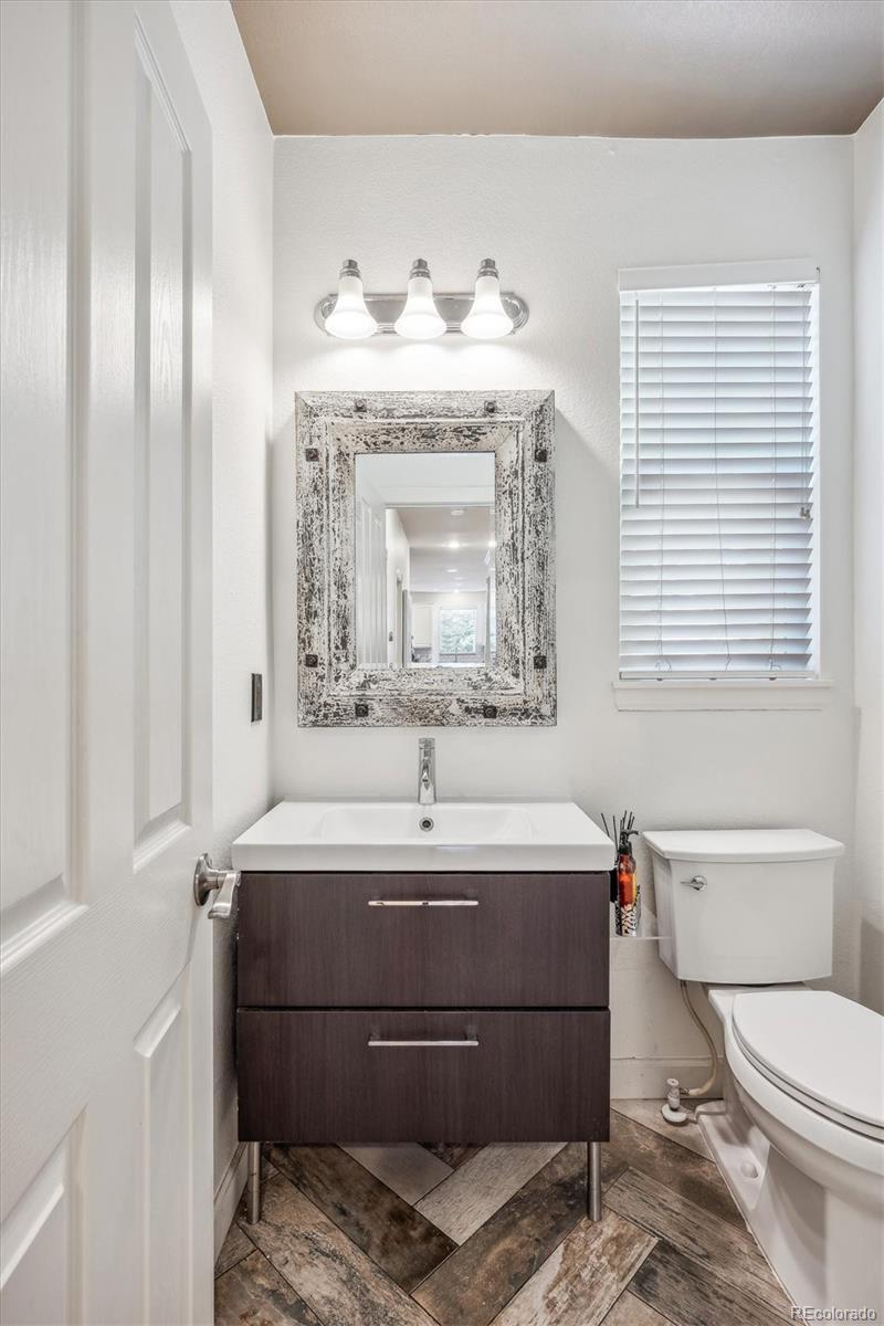 3319 Lynwood Avenue Highlands Ranch, CO 80126 - Photo 16 of 46 a bathroom with a sink and a mirror