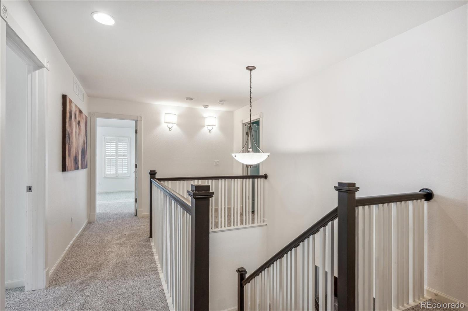 3319 Lynwood Avenue Highlands Ranch, CO 80126 - Photo 18 of 46 a view of hallway with stairs
