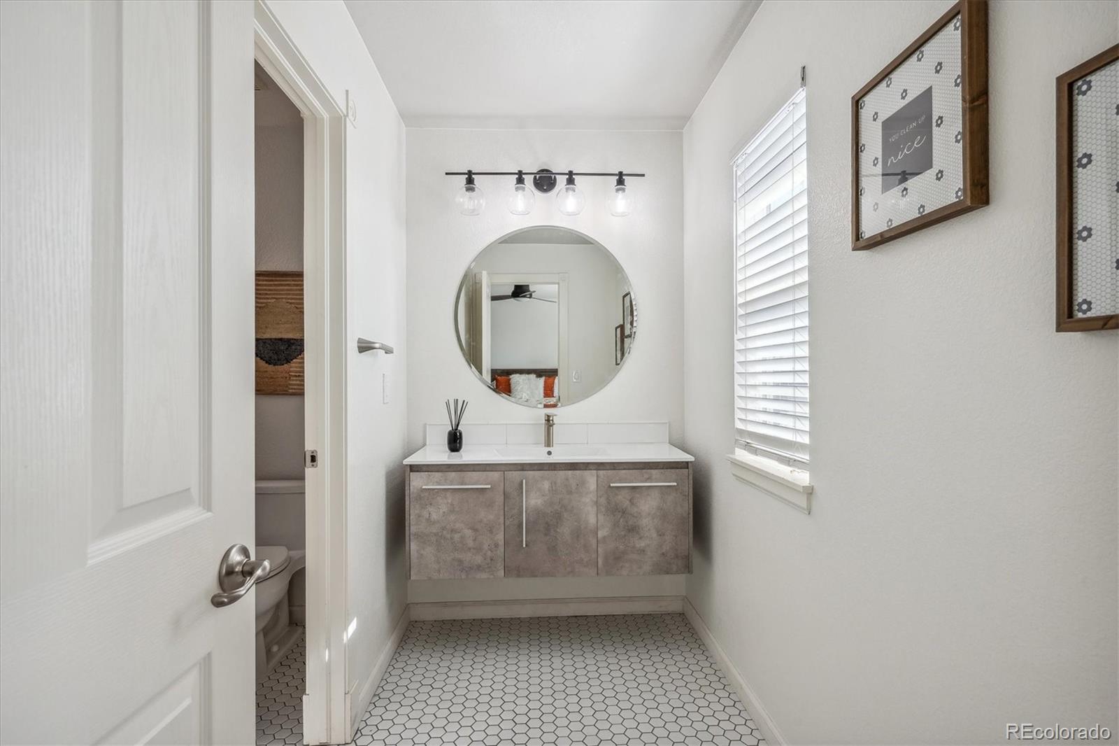 3319 Lynwood Avenue Highlands Ranch, CO 80126 - Photo 27 of 46 a bathroom with a sink and a mirror