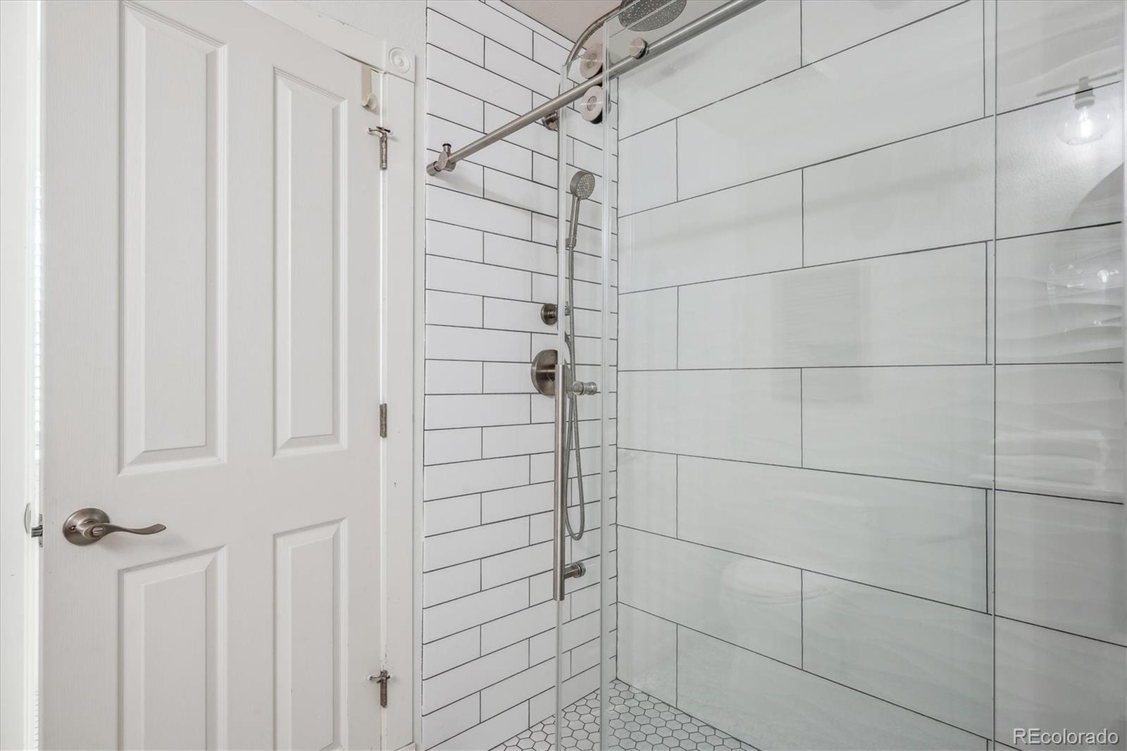 3319 Lynwood Avenue Highlands Ranch, CO 80126 - Photo 29 of 46 a bathroom with a shower