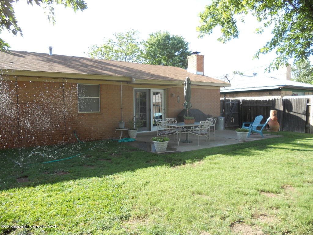 5117 McCarty Boulevard Amarillo, TX 79110 - Photo 17 of 17 a view of a house with backyard porch and sitting area
