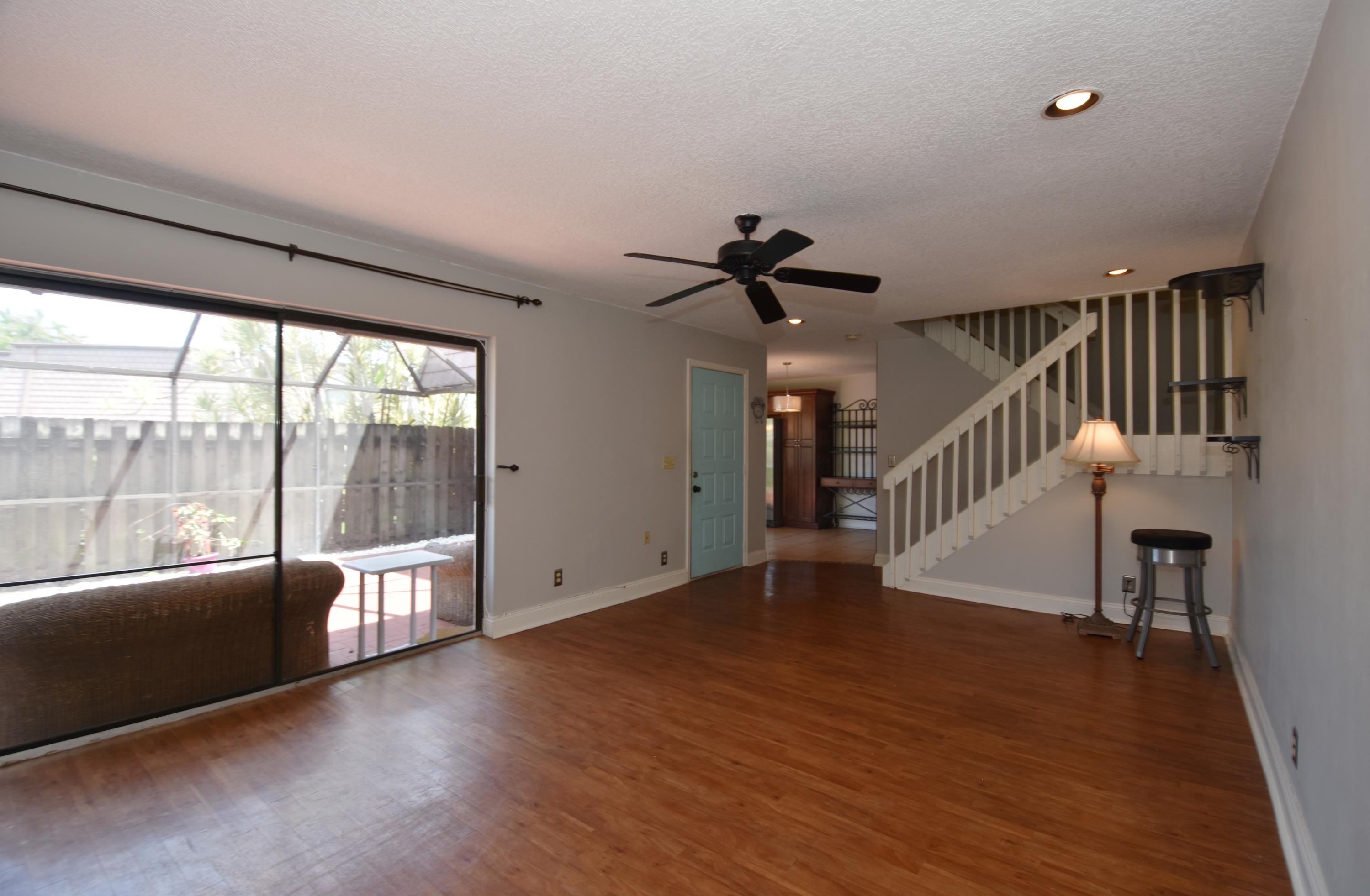 7687 Courtyard Run West Boca Raton, FL 33433 - Photo 6 of 27 LR flow to kitchen & patio