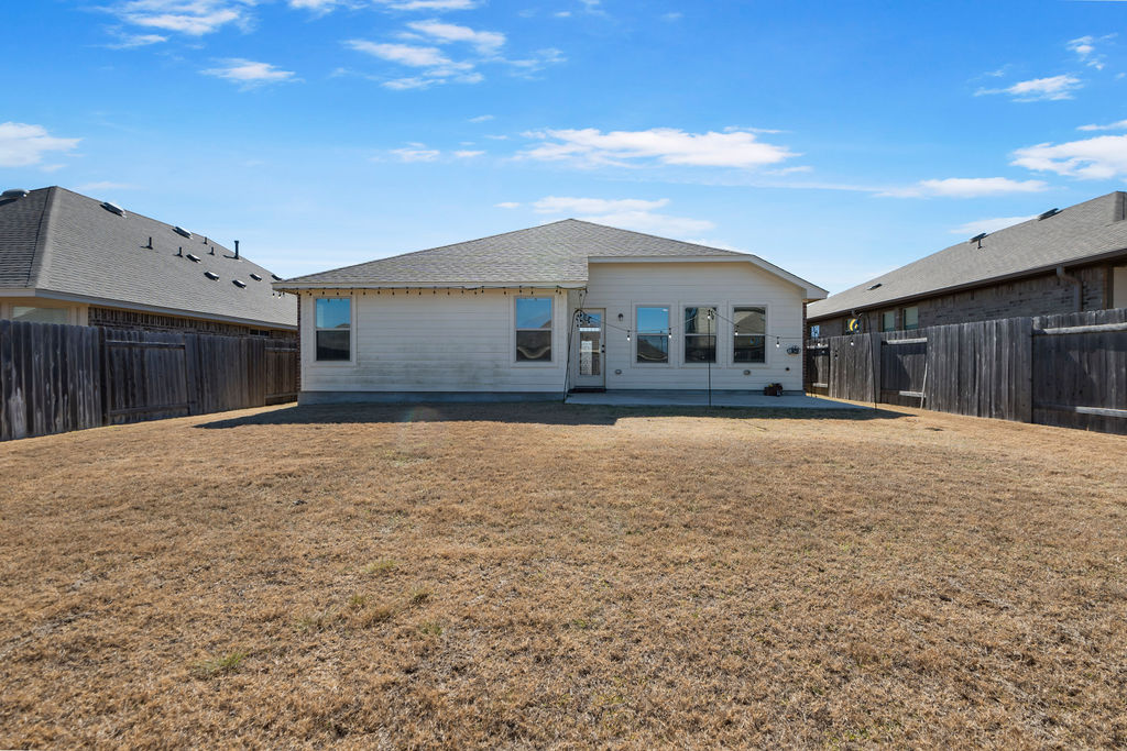 3473 Pauling Loop Round Rock, TX 78665 - Photo 30 of 33 a front view of a house with a yard
