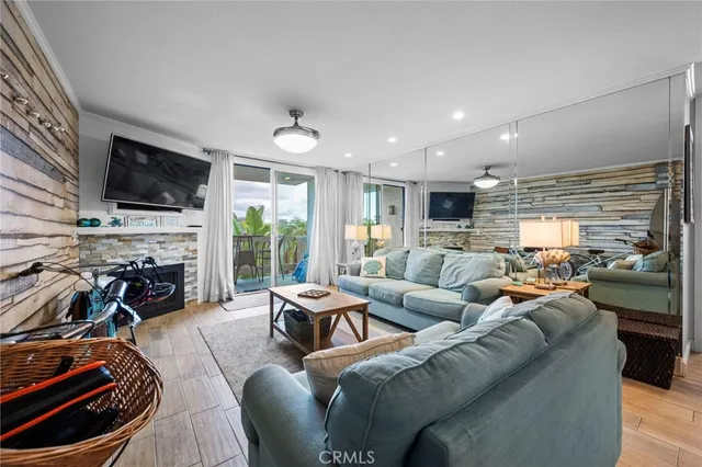 a view of balcony with furniture and a potted plant