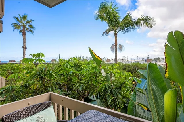 a kitchen with refrigerator and cabinets