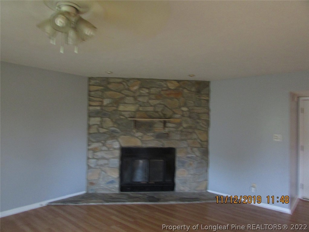 947 Rim Road Fayetteville, NC 28314 - Photo 3 of 10 a room with a fireplace