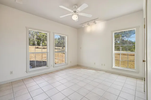 a bathroom with a sink double vanity and a mirror