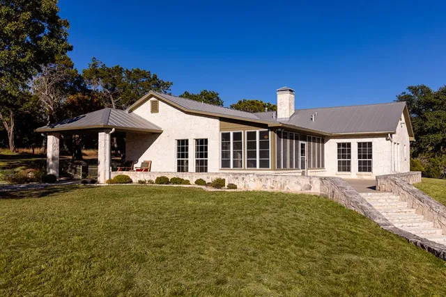 a view of a house with a swimming pool