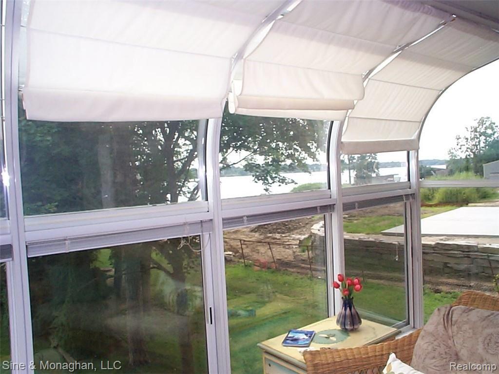 1935 River Road, Unit 23 St. Clair, MI 48079 - Photo 48 of 69 47 Enclosed Porch Window 1935 River #23.JPG