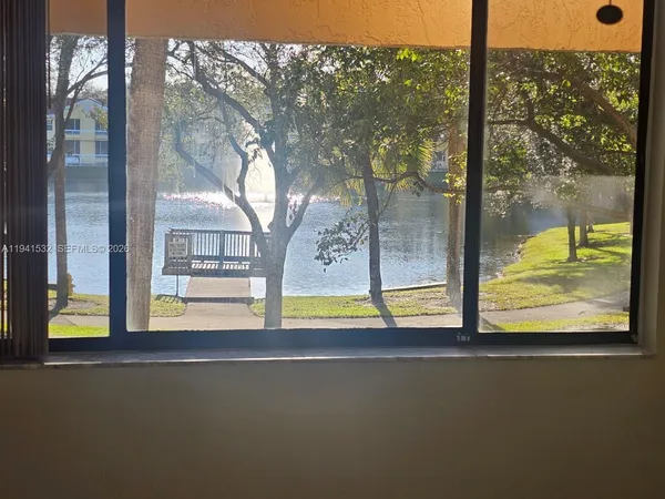 a view of swimming pool from a window