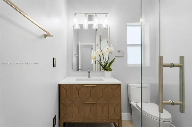 a dining room with table and chairs