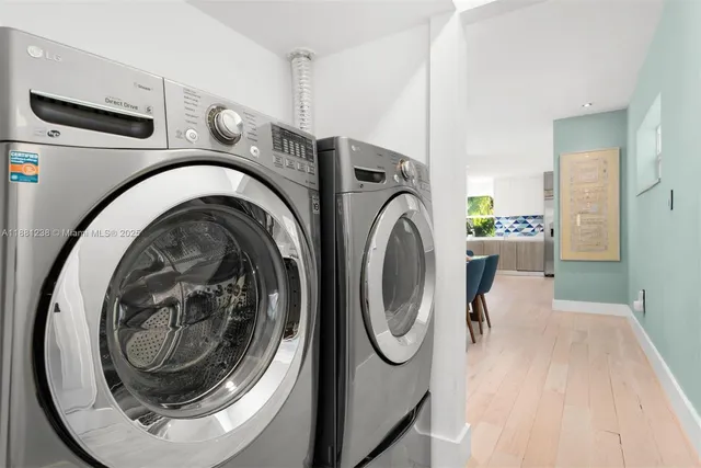 a view of a kitchen with washer and dryer