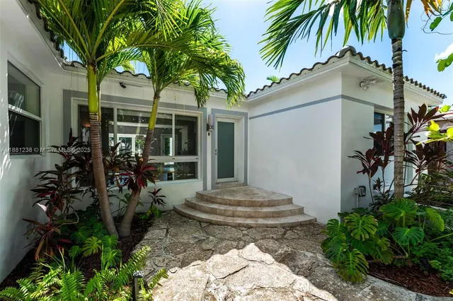 a view of a backyard of the house