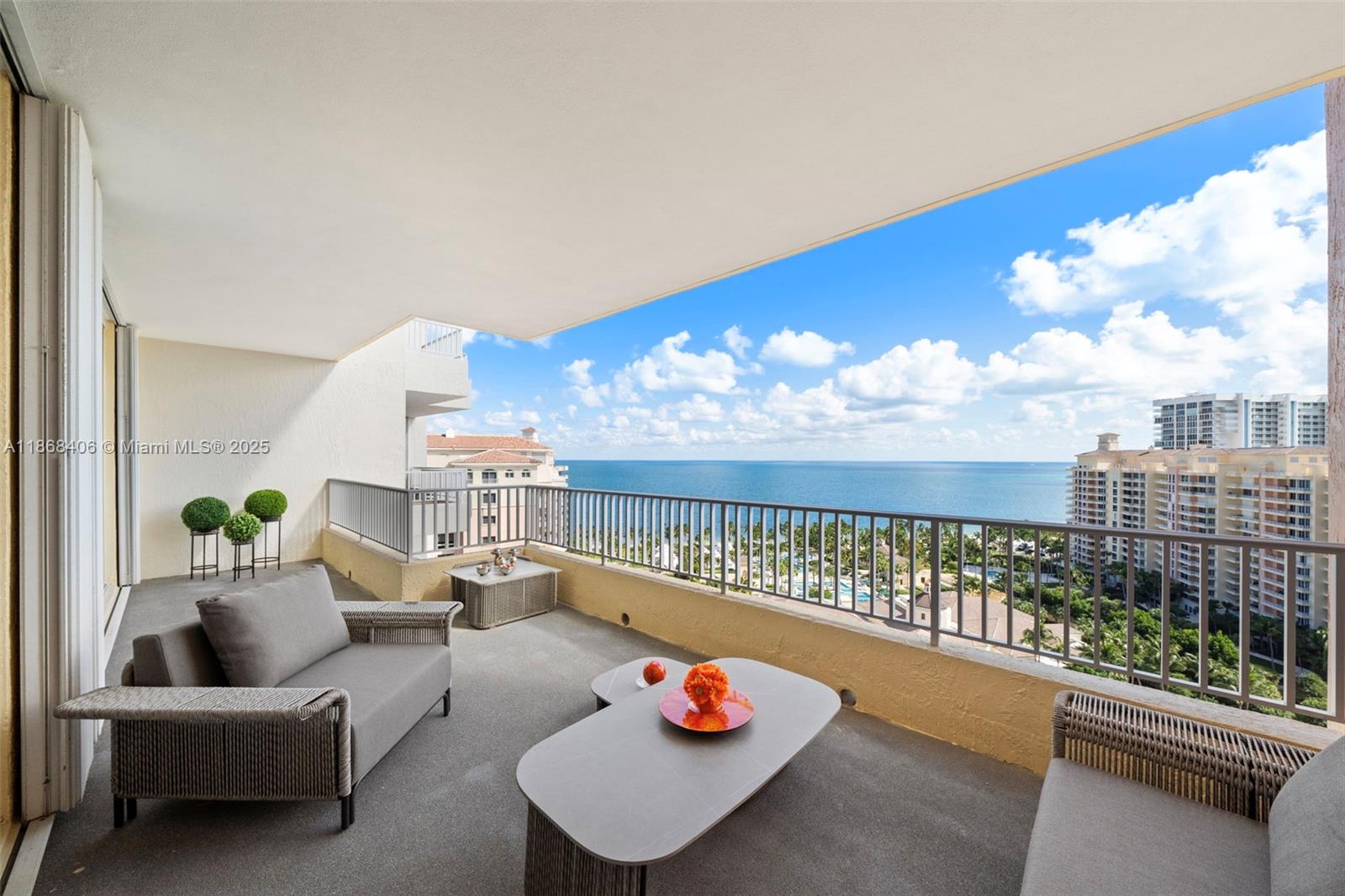 781 Crandon Boulevard, Unit 1802 Key Biscayne, FL 33149 - Photo 3 of 59 a living room with furniture