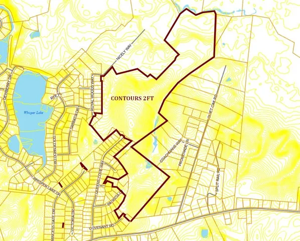 a room that has a table and wooden floor next to a blue wall